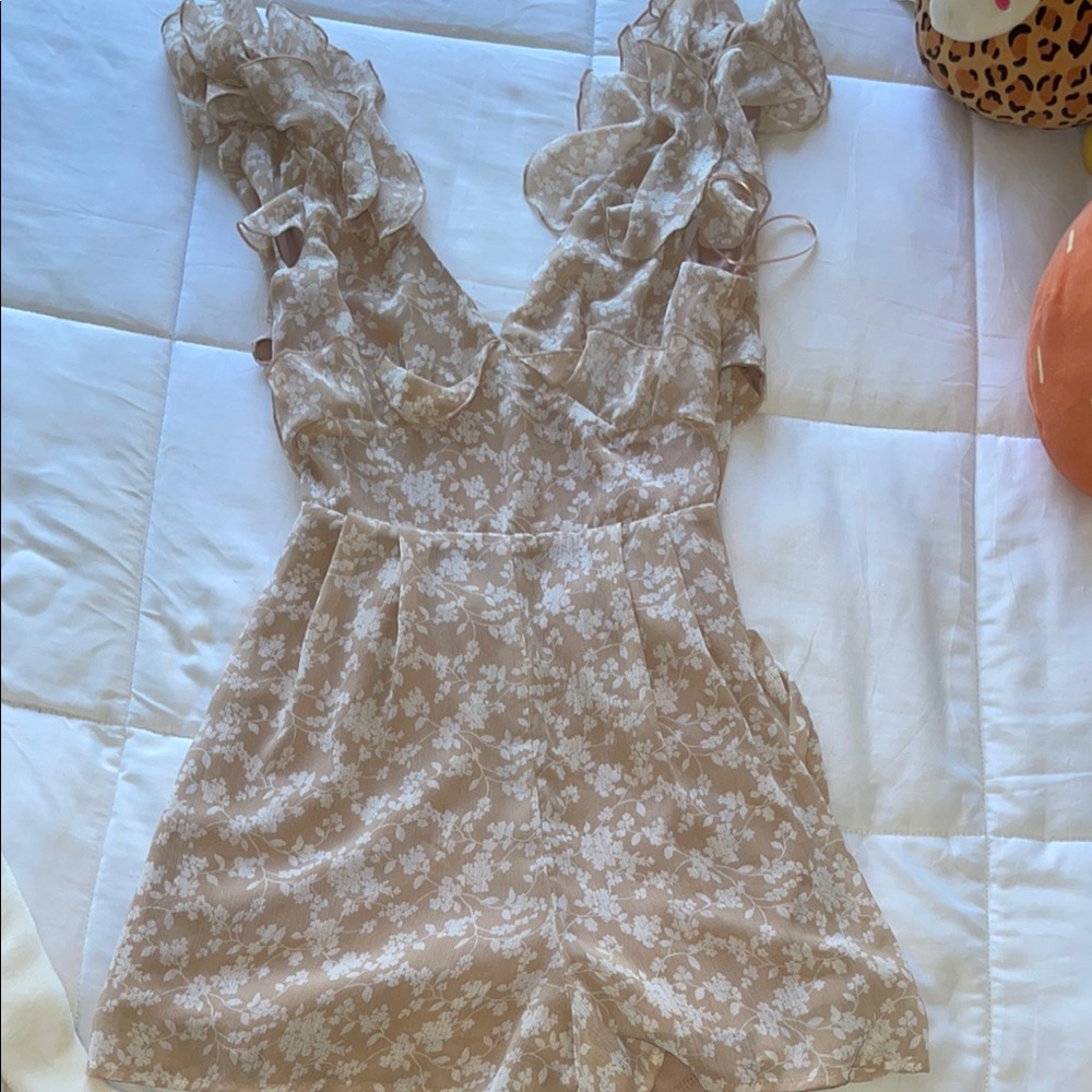 Franchesca’s Floral Ruffle Sleeve Romper